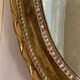 Antique oval mirror with gold leaf – Pediment with bow & floral motifs style