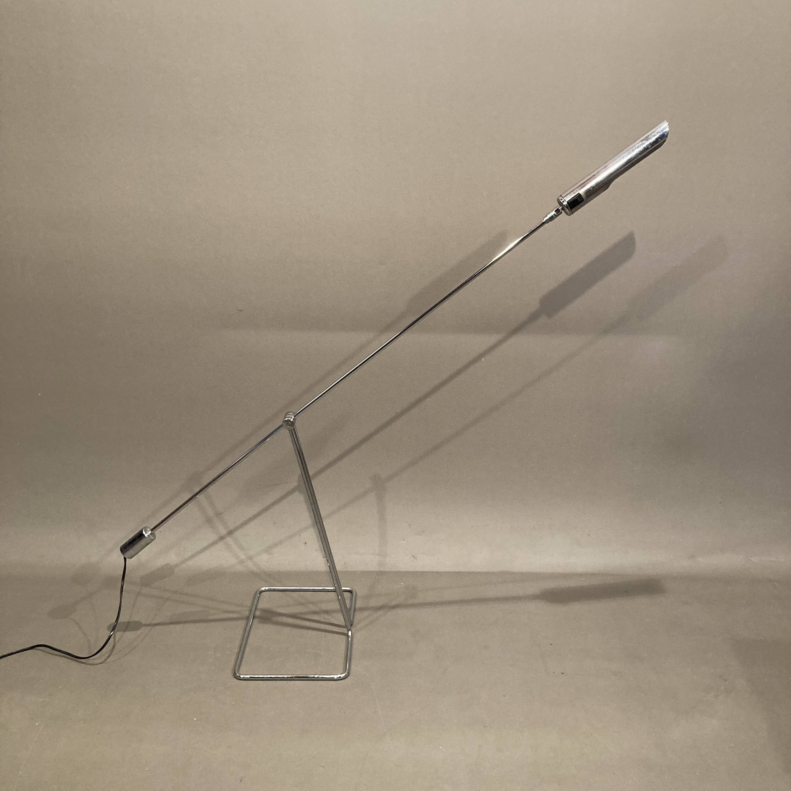 Large modular chrome lamp.