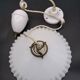 Suspension with porcelain and glass counterweight.