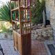 Rattan and canning furniture with vintage shelves