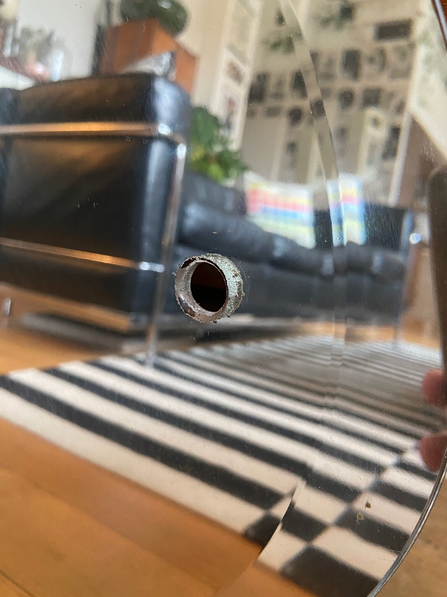 Bevelled oval mirror