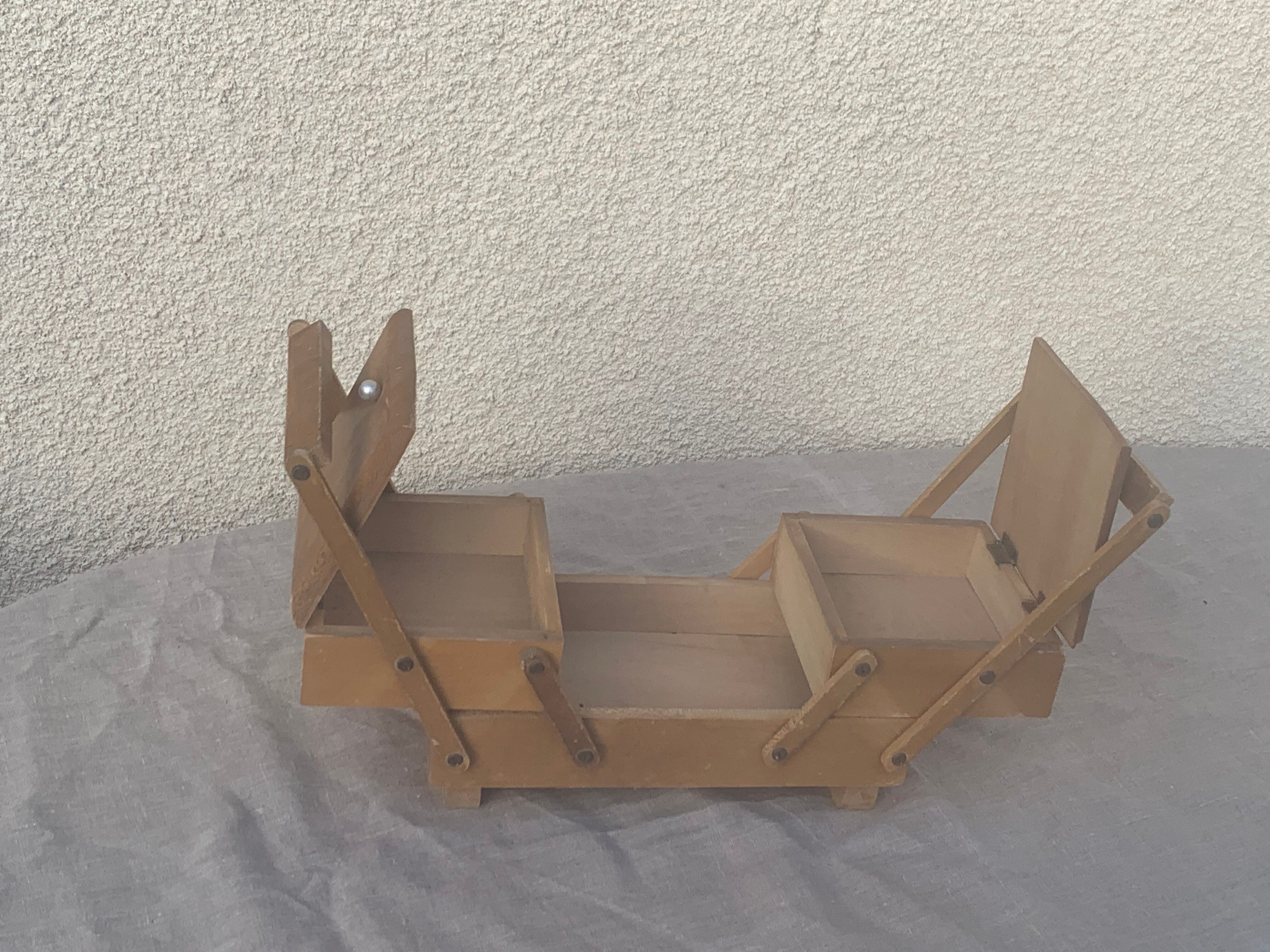Sewing box in old varnished wood