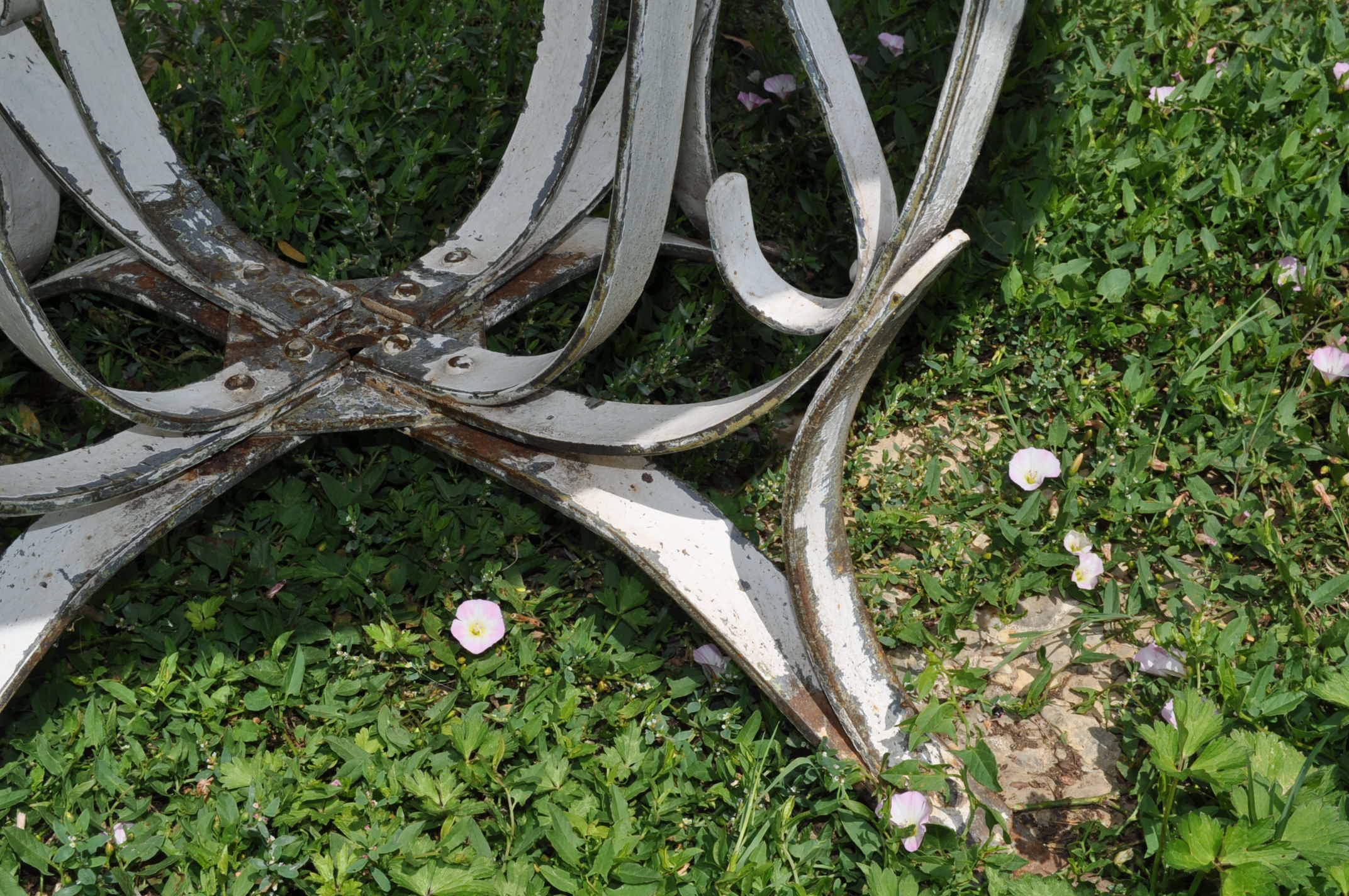 Sheet metal and iron garden table