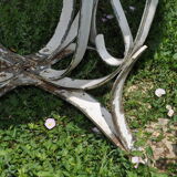 Sheet metal and iron garden table