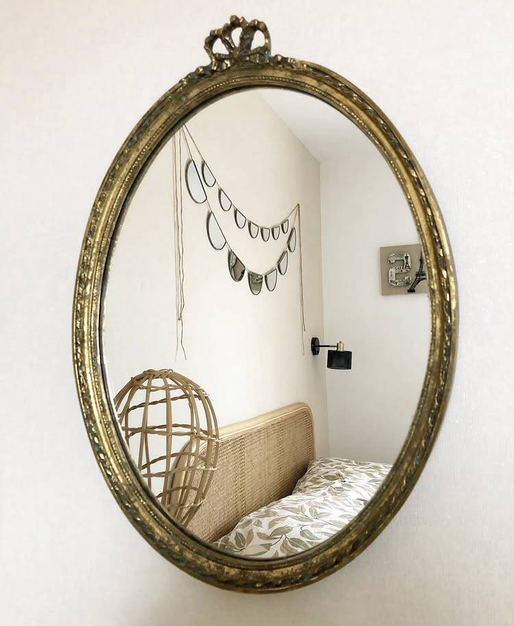 Large vintage oval mirror