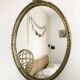 Large vintage oval mirror