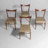 Set of slender mid-century dining chairs with finely curved backs, 1960s