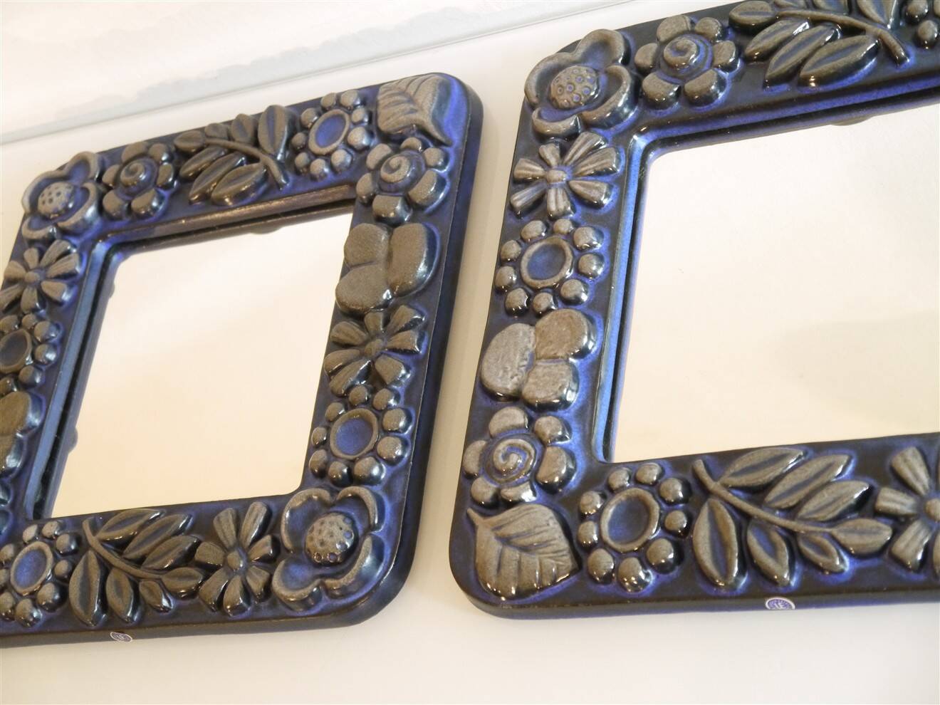 Pair of Scandinavian mirrors in ceramic by Berit Ternell.
