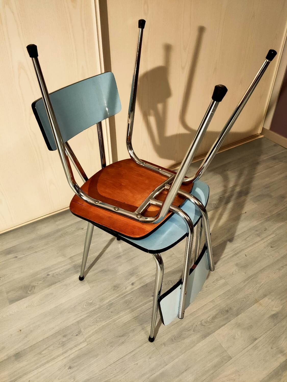 Pair of blue formica chairs