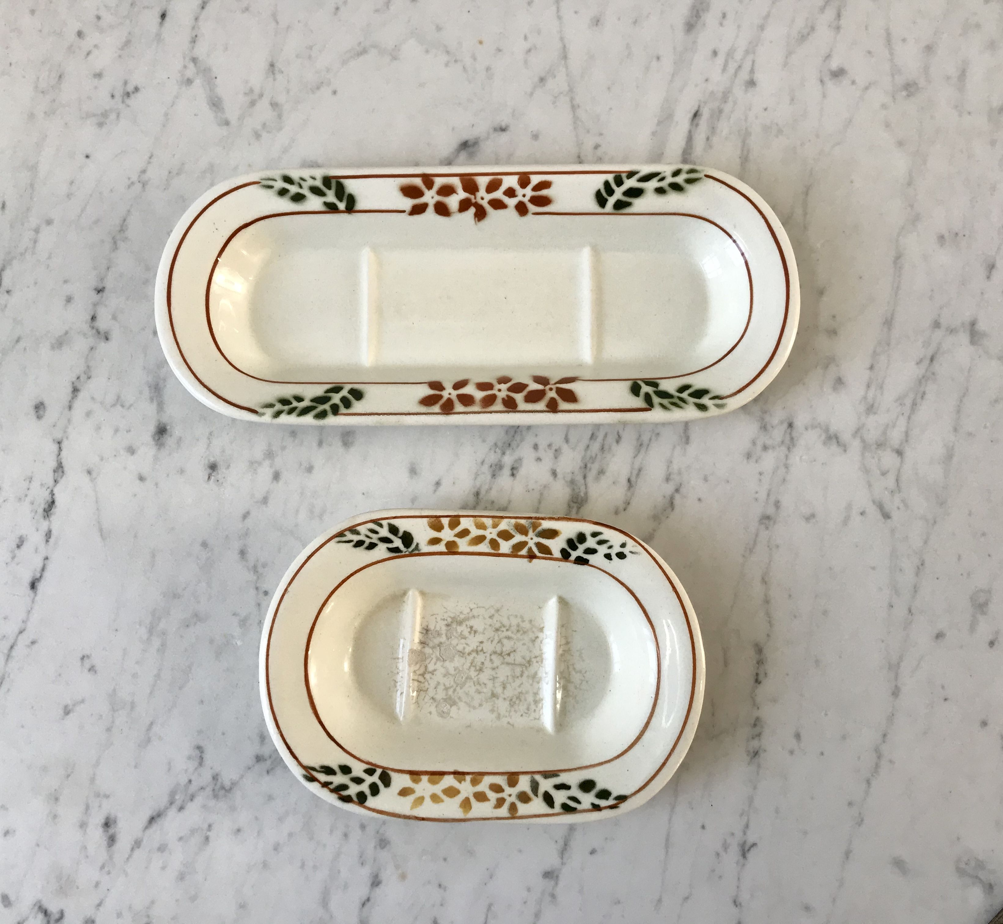 Set of two soap holders