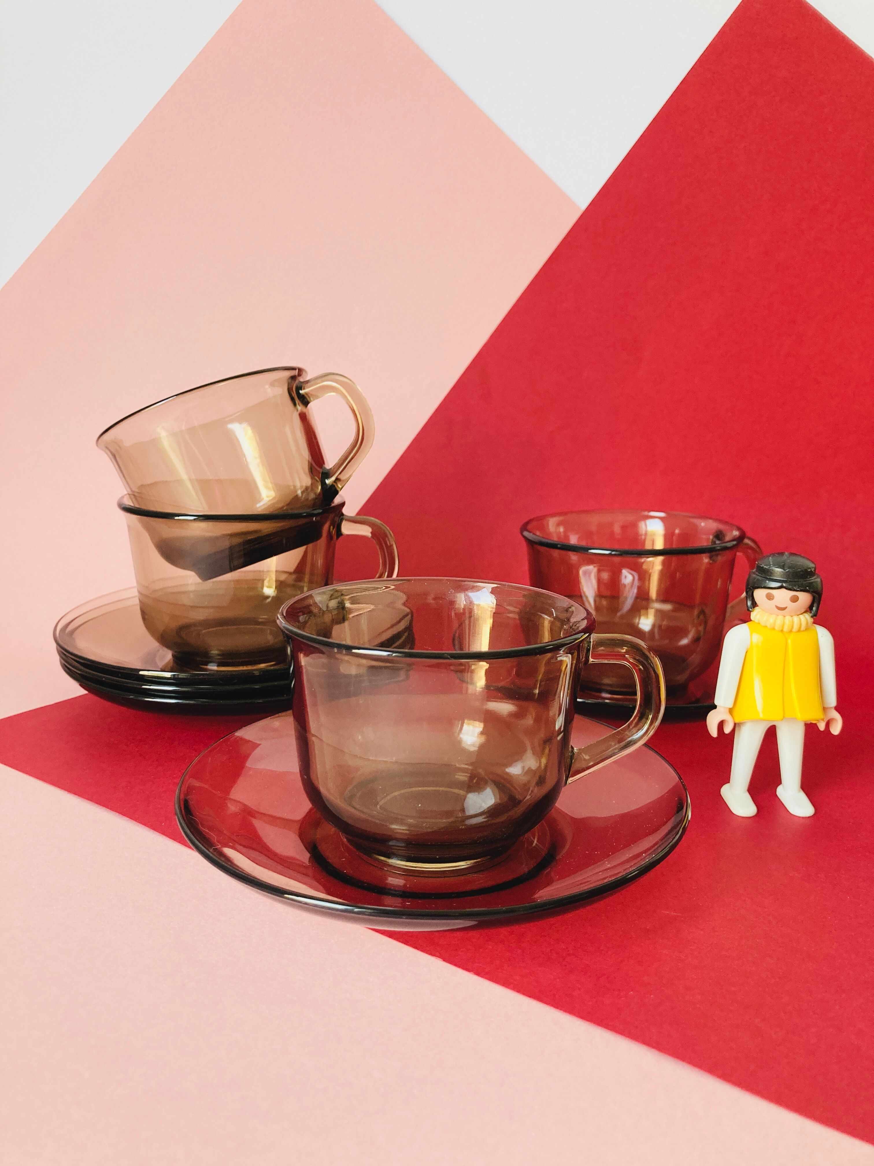 4 Arcoroc coffee cups and saucers in black transparent glass