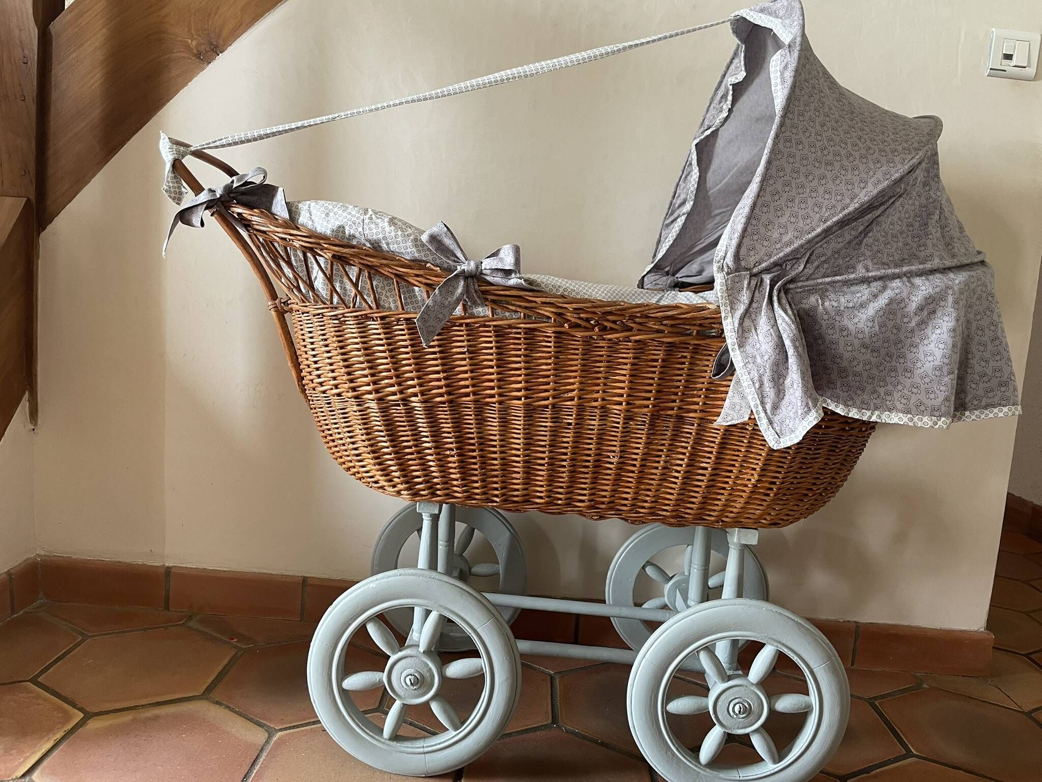 Antique rattan cradle in very good condition. Sold with or without upholstery.