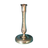 Large candlestick in chiseled brass