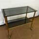 Console / desserte en laiton et verre fumé