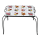 Vintage coffee table in wrought iron with floral tiles.
