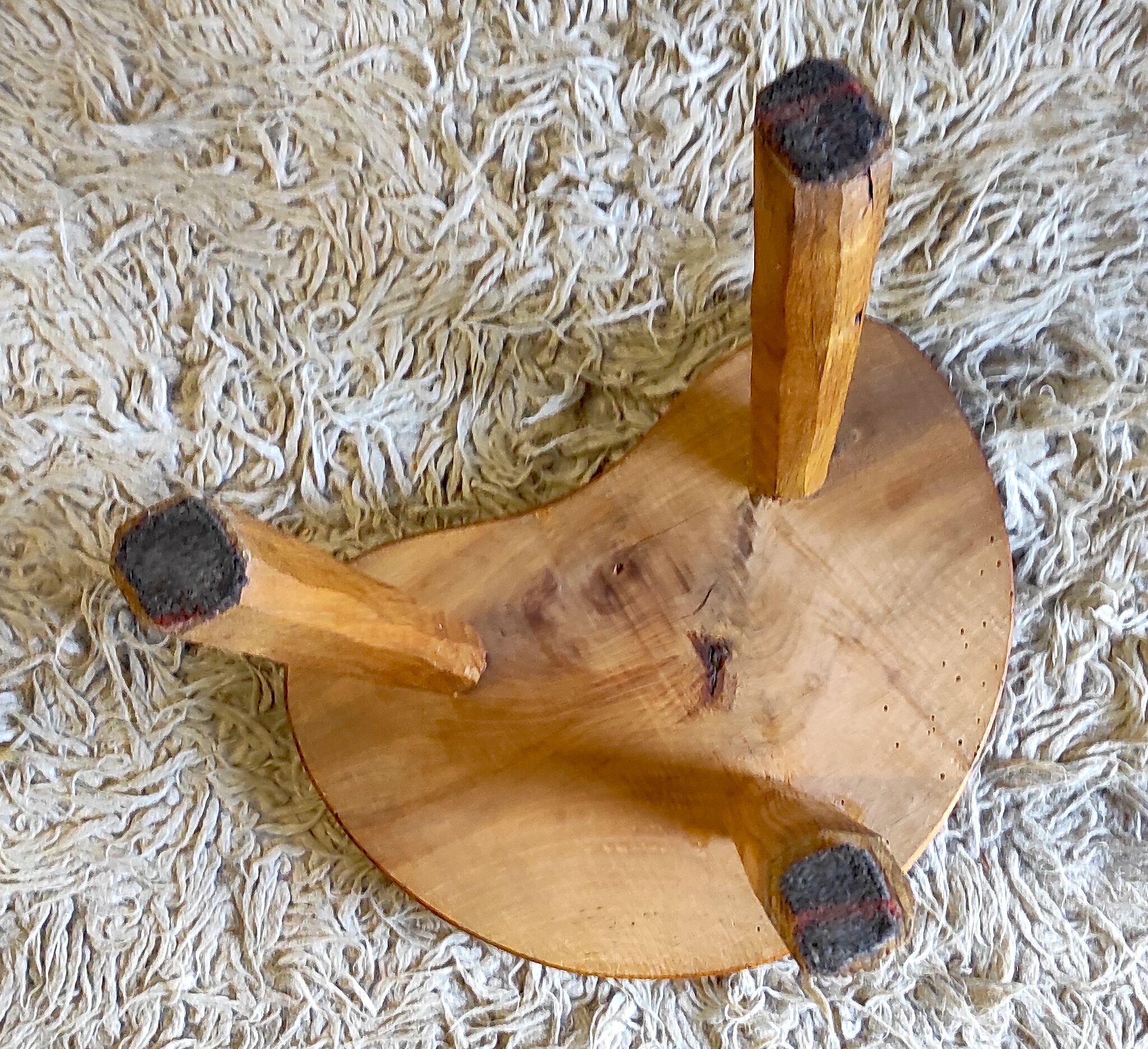 Brutalist tripod stool in solid wood, 80s