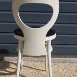 6 baumann chairs, white gull with black faux leather.