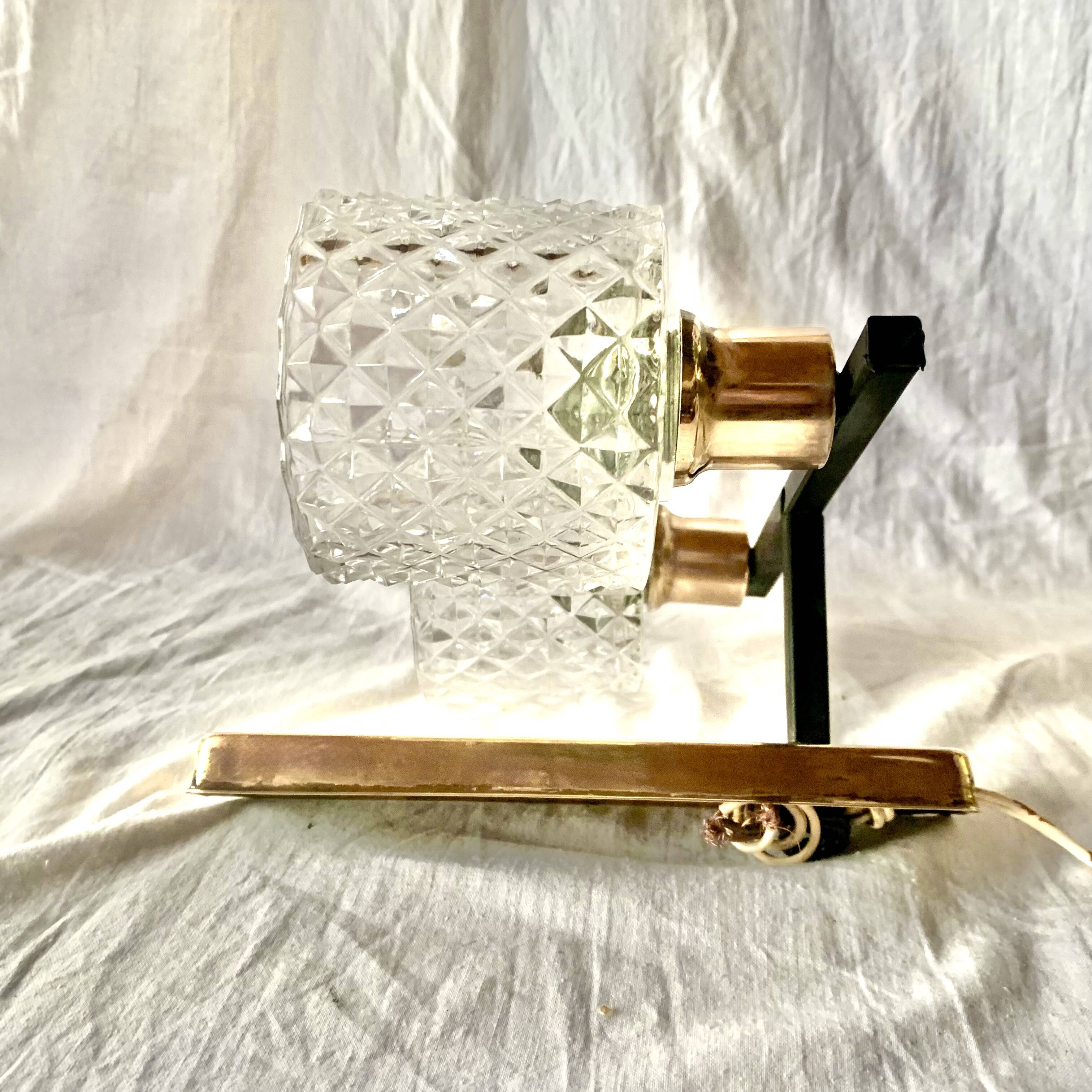 Pair of wall sconces in gilded brass and textured glass