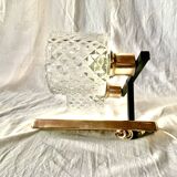 Pair of wall sconces in gilded brass and textured glass