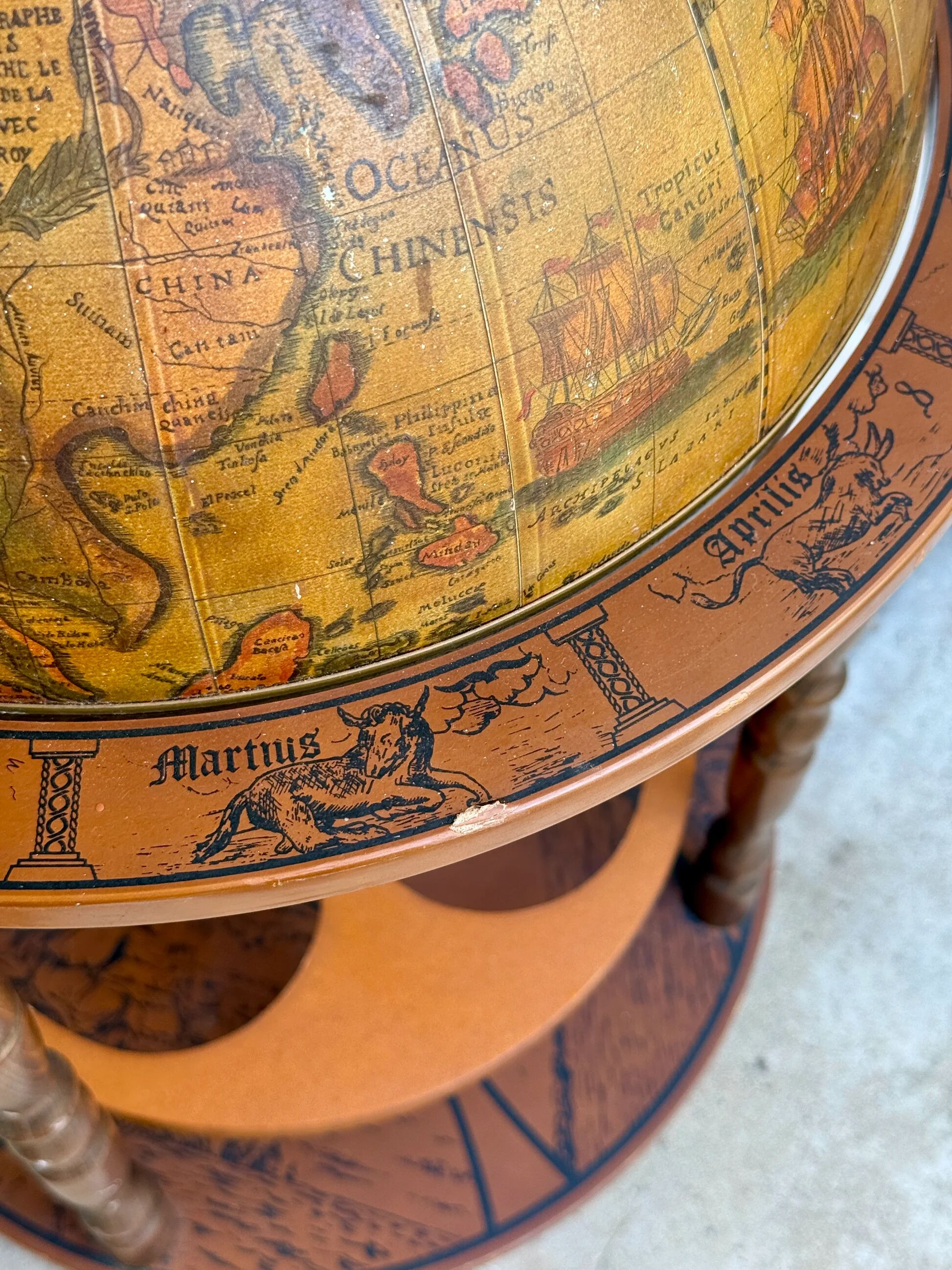 Globe bar on wheels with a rotating tray