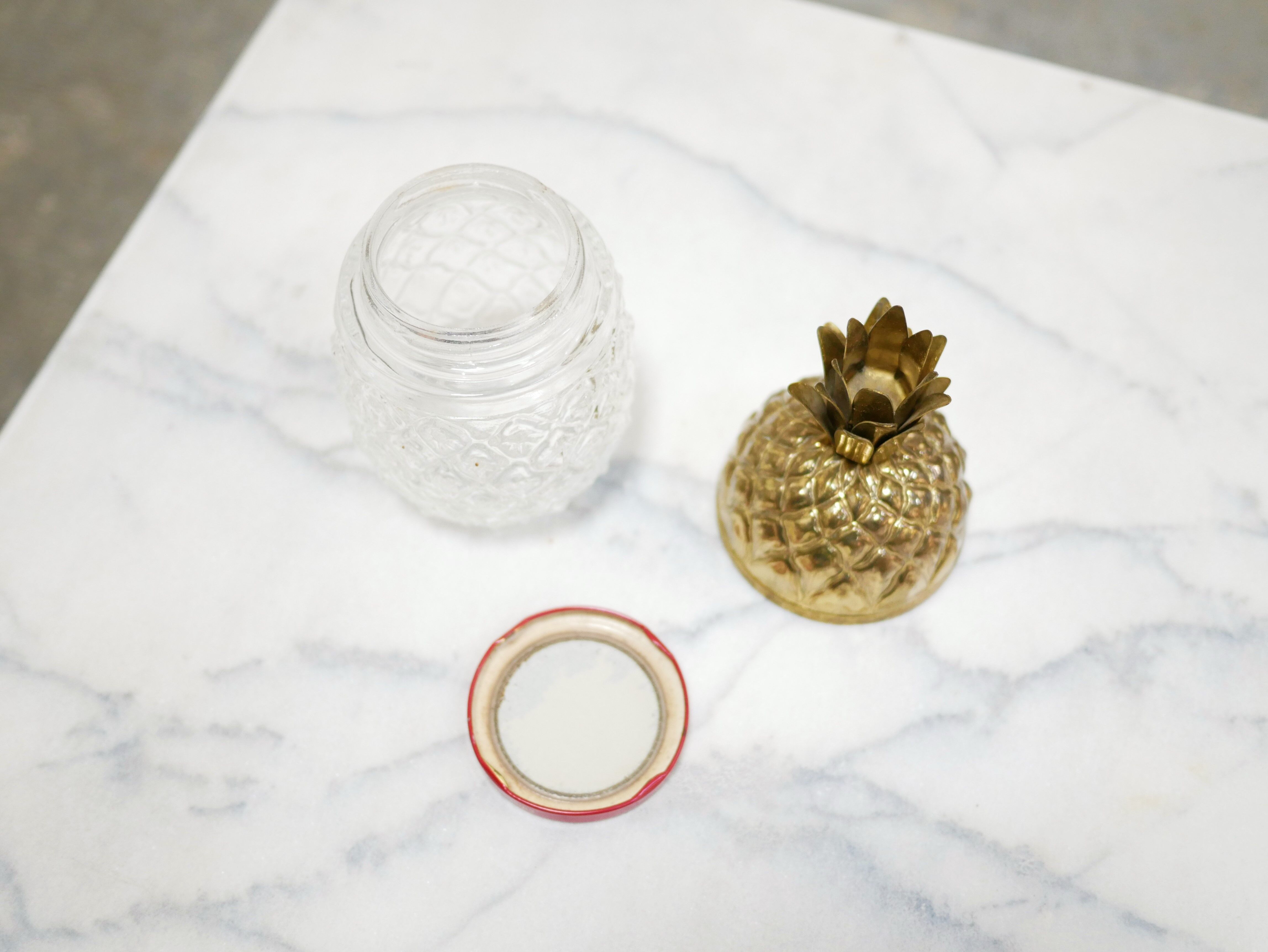 Vintage pineapple jar made of glass and brass