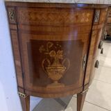 Louis XVI style half-moon chest of drawers in late nineteenth century marquetry