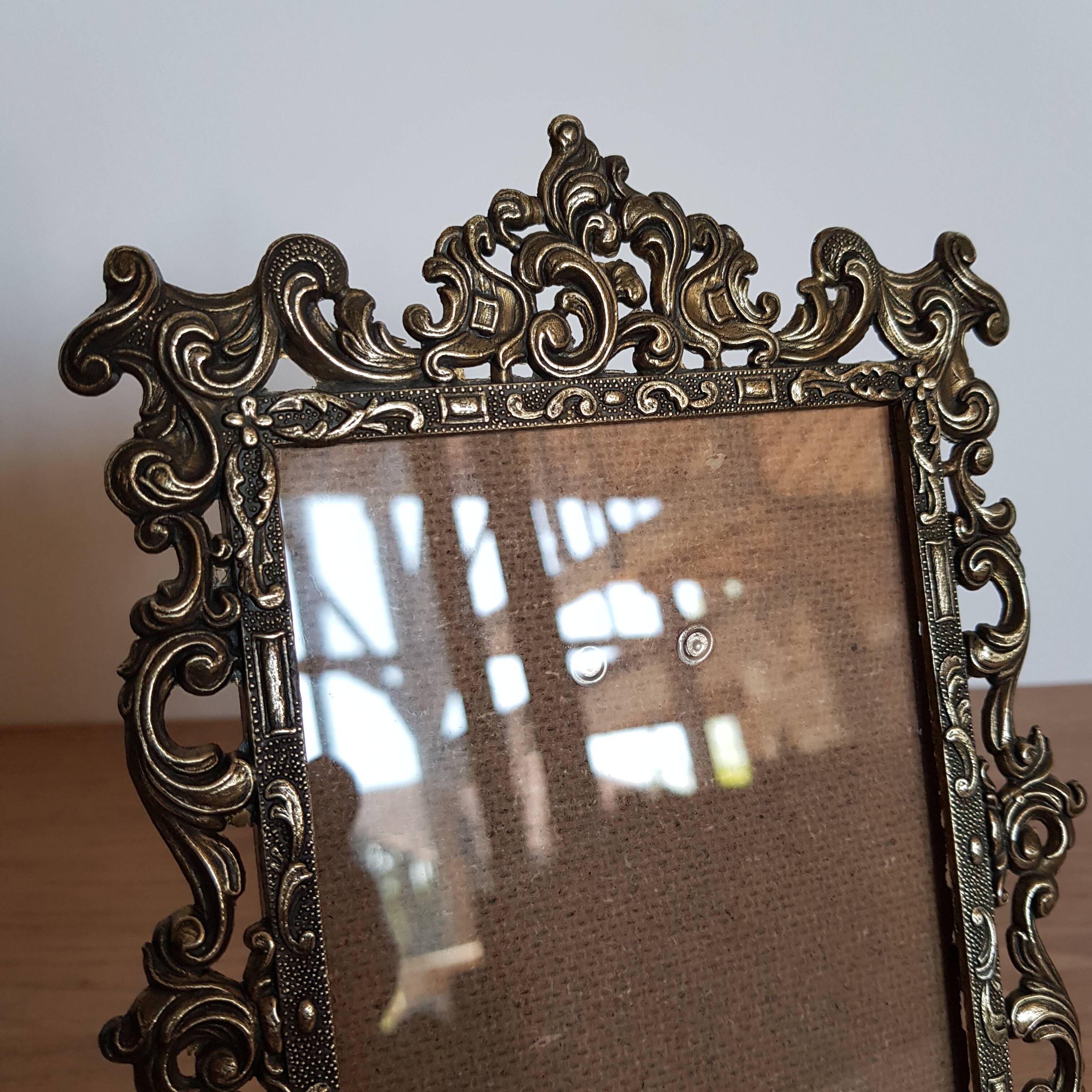 Baroque brass frame