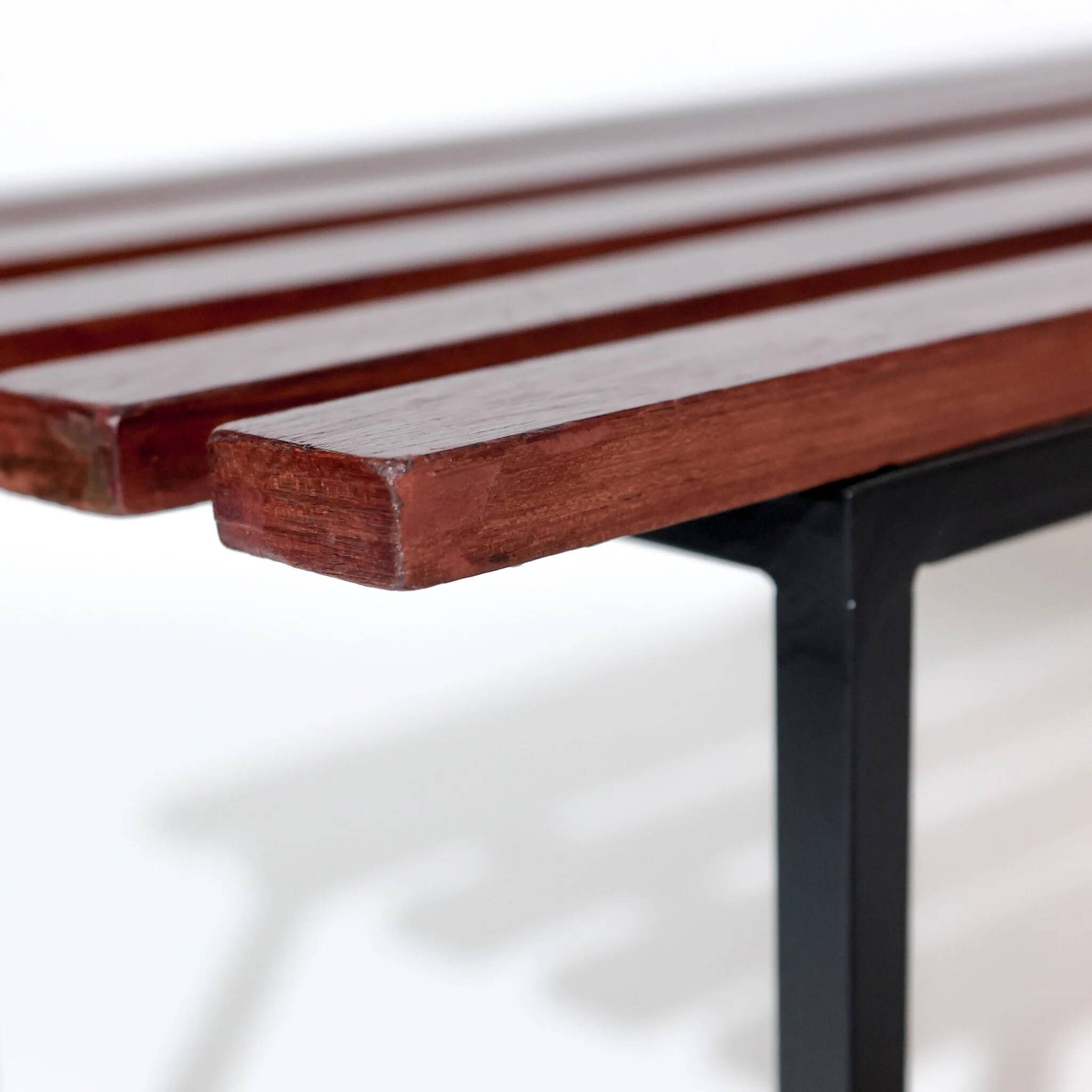 Vintage modernist Italian bench from the mid-century in slatted teak, black metal frame, Italy, 1960s.