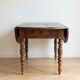 Antique solid wood drop-leaf dining table