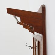 Art Deco oak carved wall coatrack with mirror, France 1920s