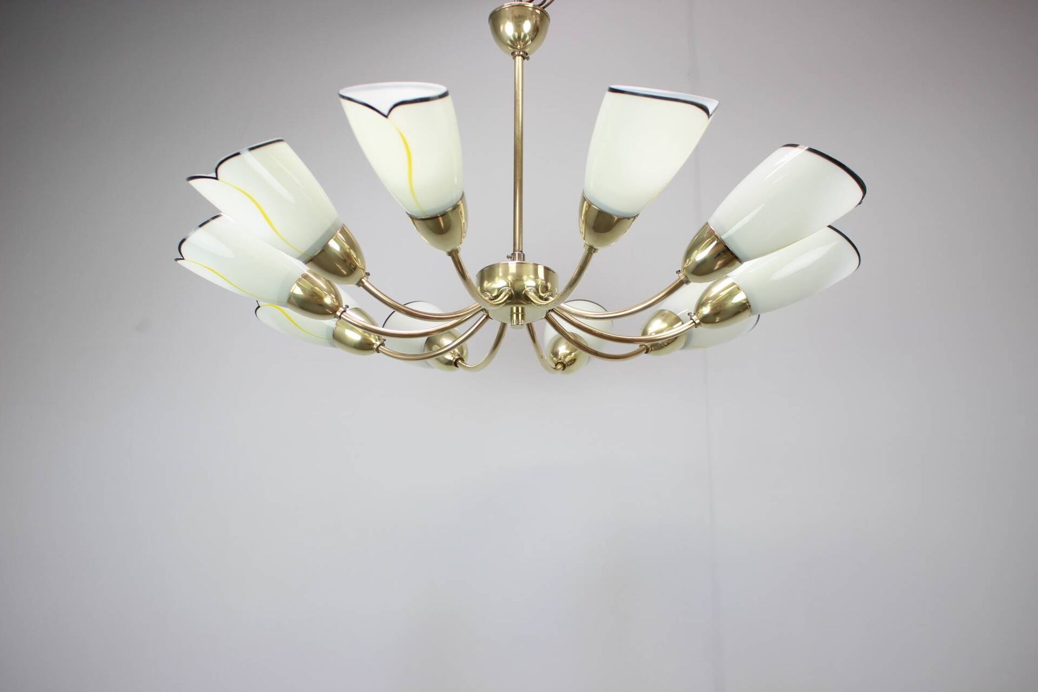 Brass and glass ten-arm chandelier from the mid-century, 1960s.