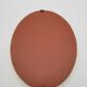 Small old oval mirror in gilded wood