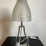 Metal foot lamp with thick glass lampshade