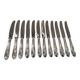 12 silver-plated metal dessert knives with rocaille ribbon decoration, 21.4 cm