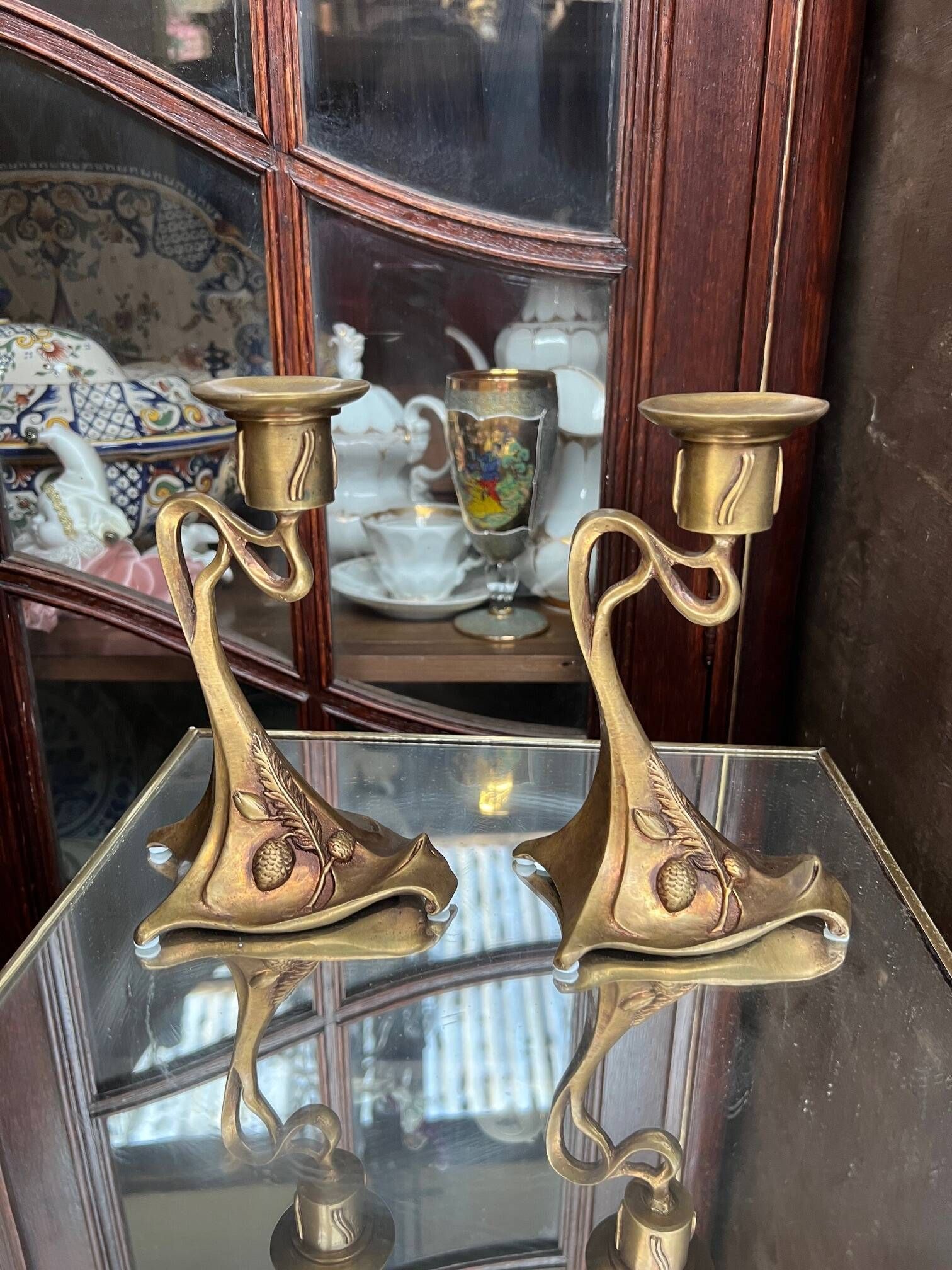 Pair of Art Nouveau style candlesticks. Solid bronze.