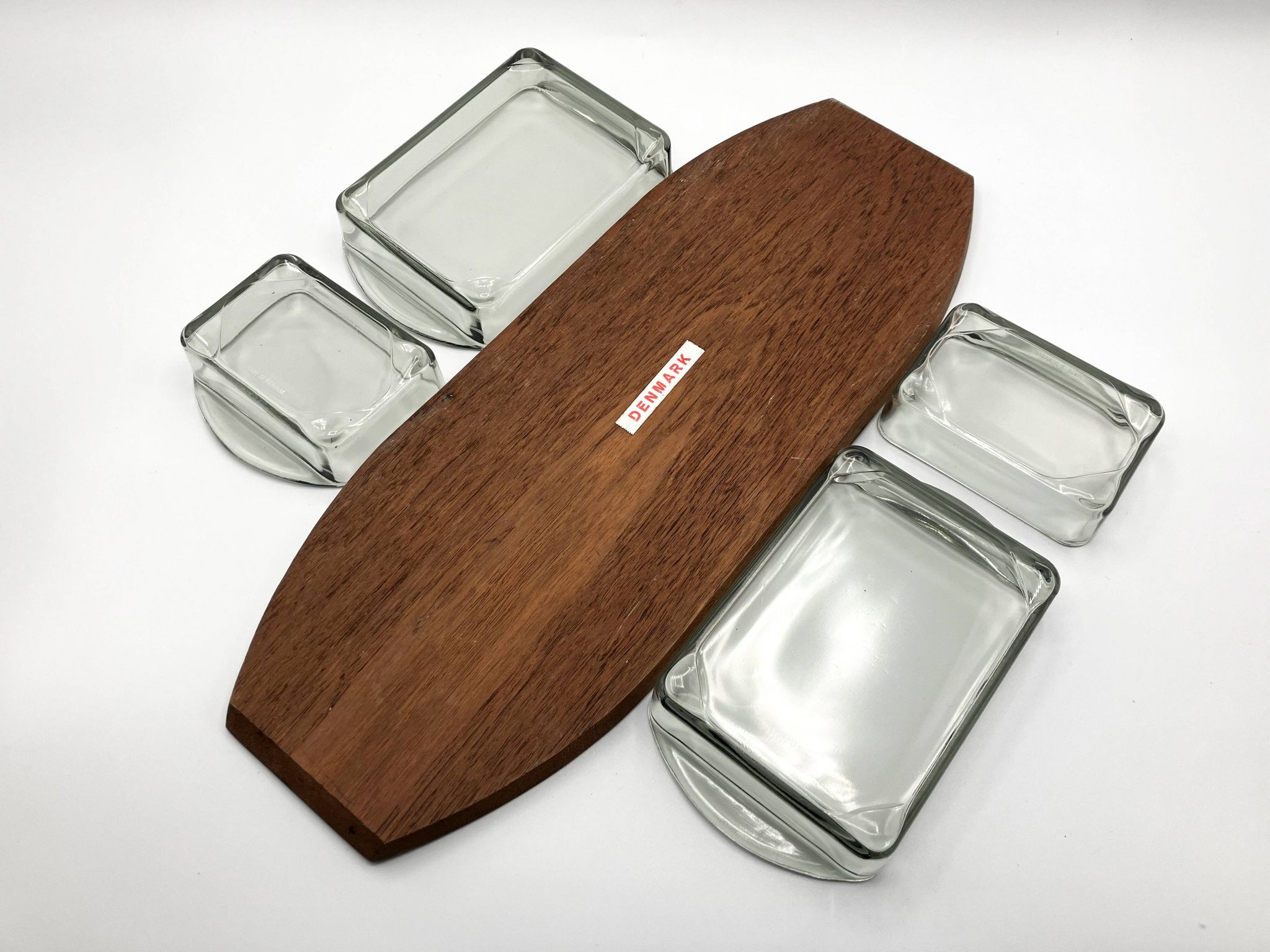 Teak tray and its 4 stackable glass dishes • Denmark • 1960