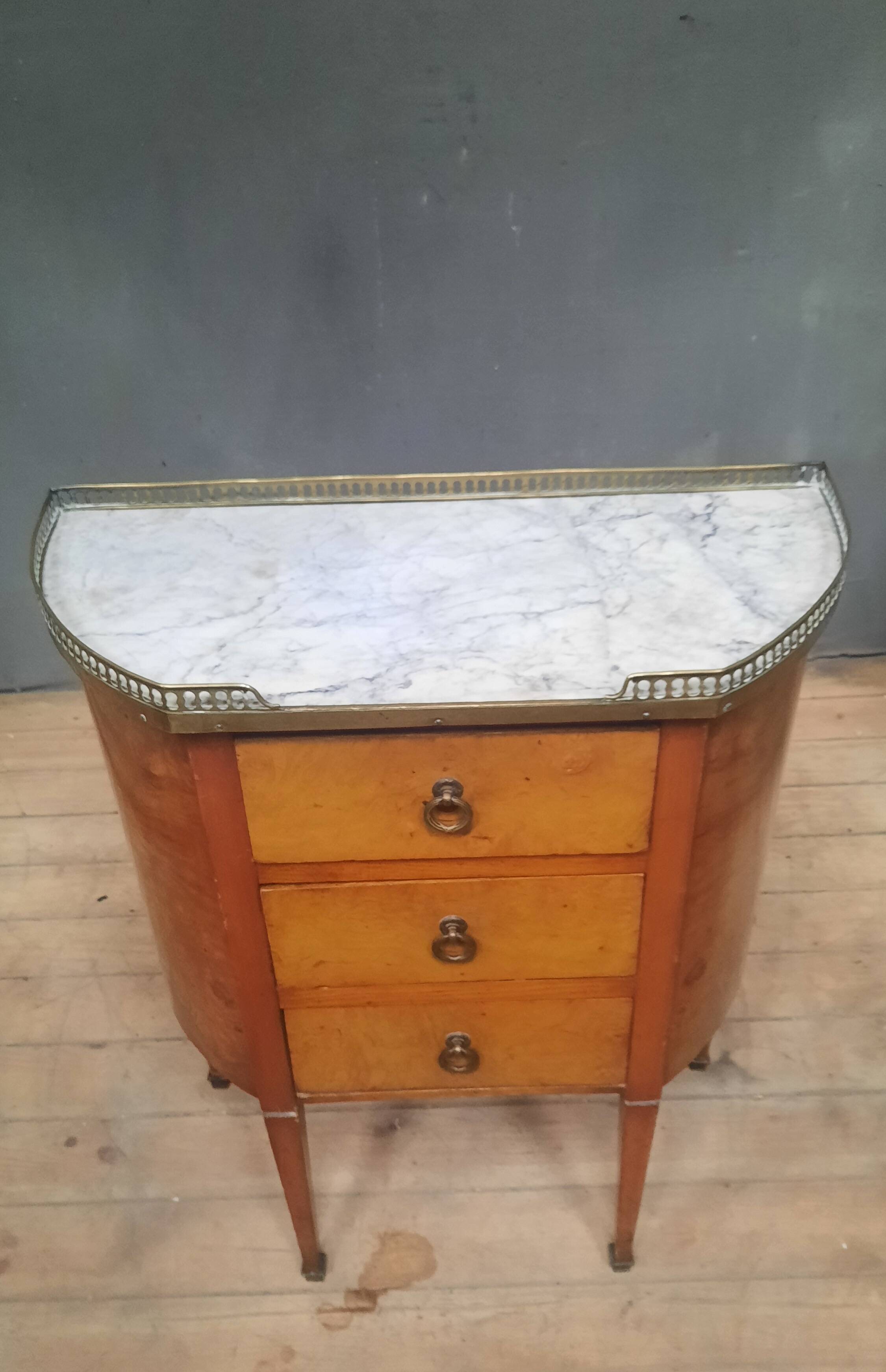 Small Louis XVI style chest of drawers with rounded sides
