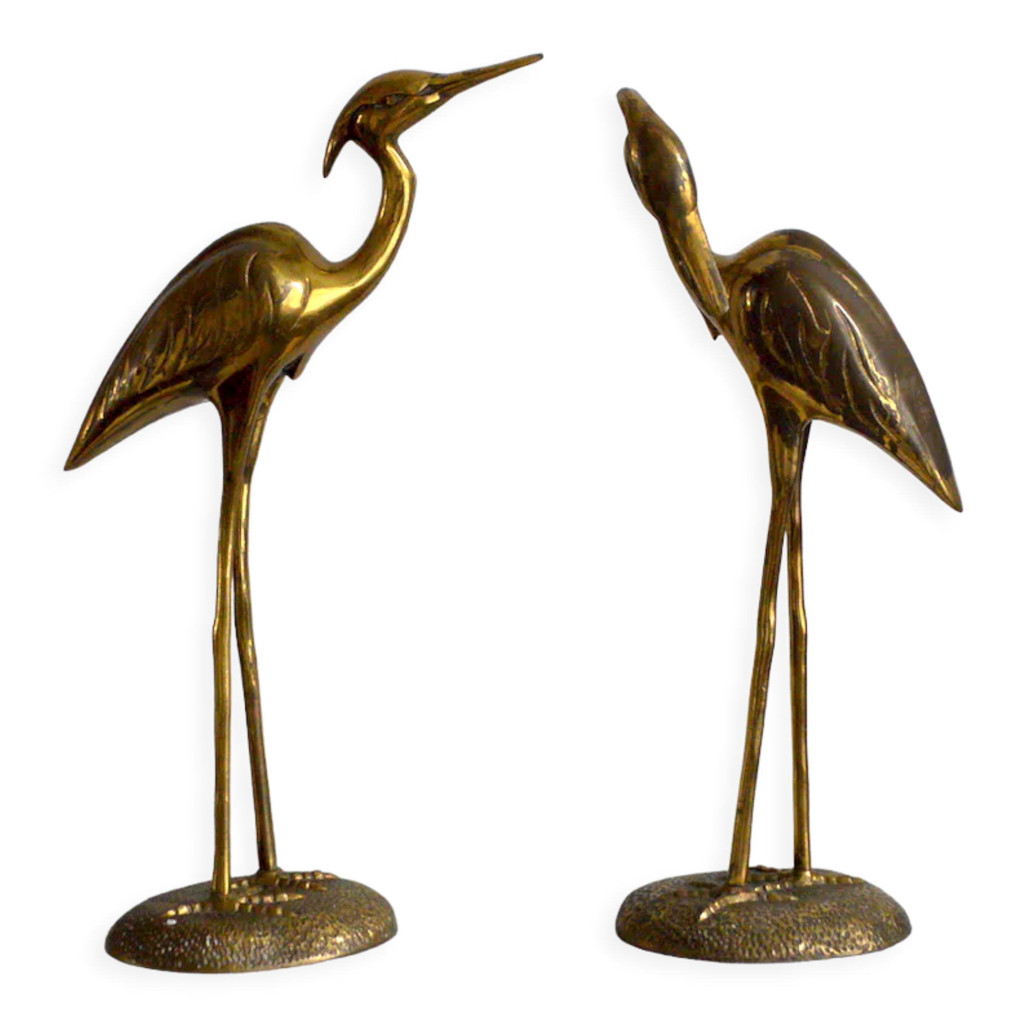 Brass herons couple