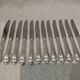 12 silver-plated dessert knives by silversmith Florian Frionnet, 21.2cm