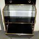 70s lacquered black and gold hairdresser