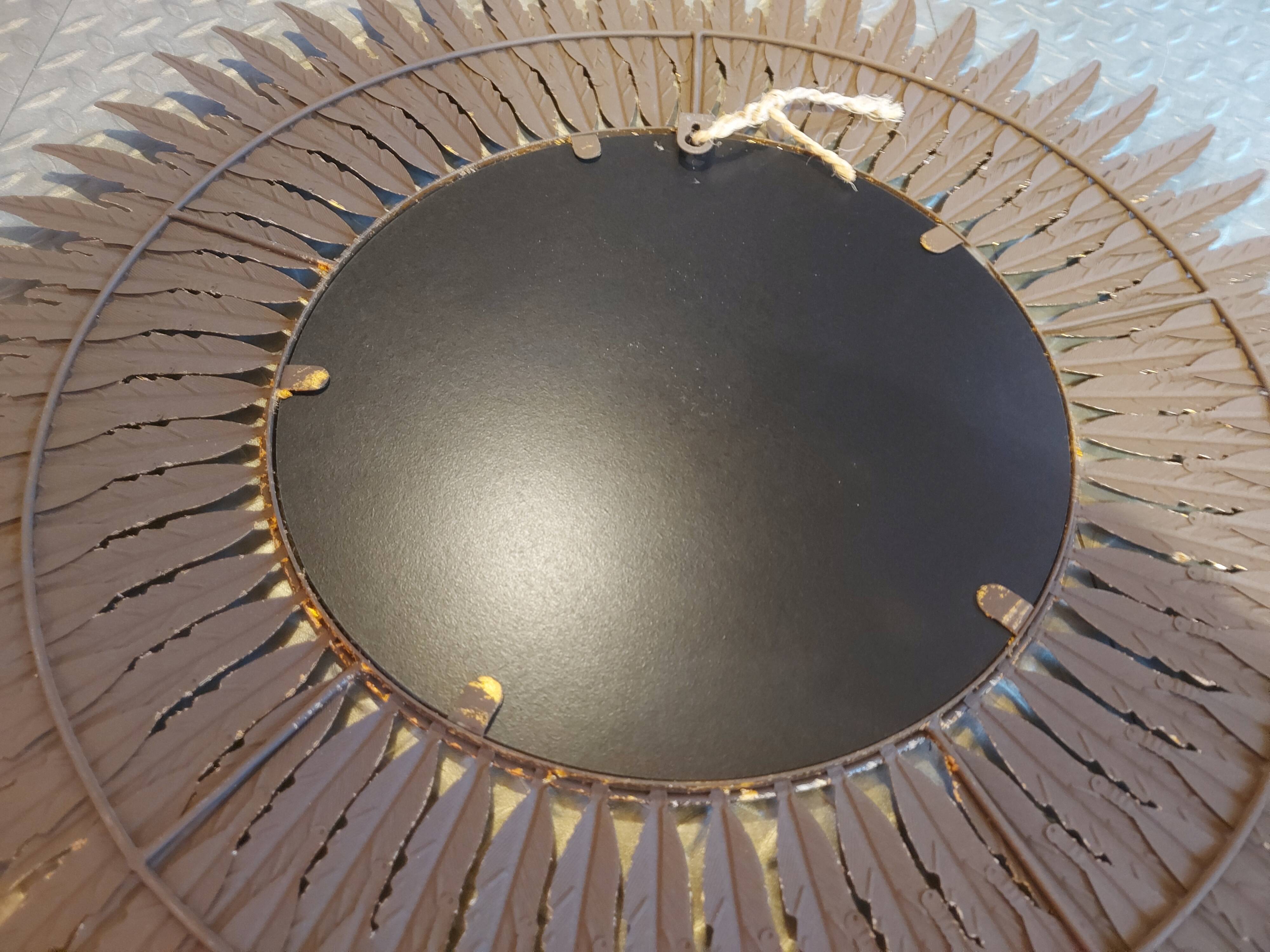 Miroir soleil en métal doré 62cm