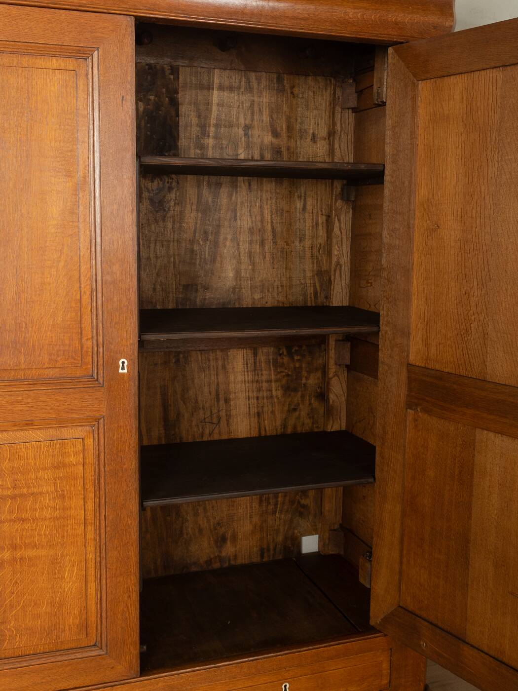 Classic antique wardrobe made of oak, pre-1900