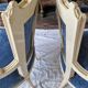 Pair of Louis XVI cabriolet armchairs in cream and blue French elegance late 19th century