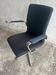 Fritz Hansen 'Oxford' Arne Jacobsen swivel chair — black wool upholstery, aluminium base, 1970s
