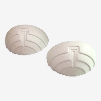 Wall sconces in stone and in the shape of a basin