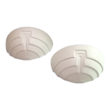 Wall sconces in stone and in the shape of a basin