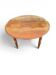Antique drop-leaf table in wood, with turned legs and castors.