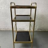 Small rolling trolley in brass and black plastic