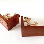 Wood and Bakelite bookends with marine anchors