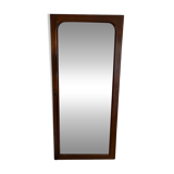 Beveled mirror with wooden contours